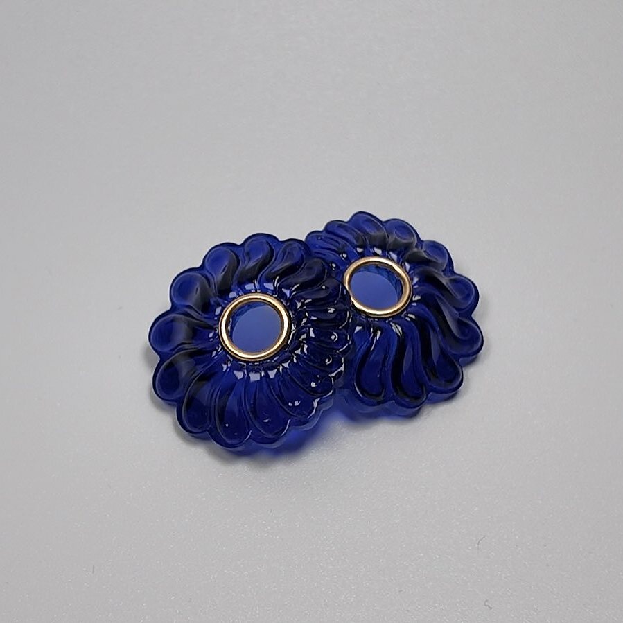 Pair of dark blue acrylic flower-shaped stud earrings with gold-plated silver rings