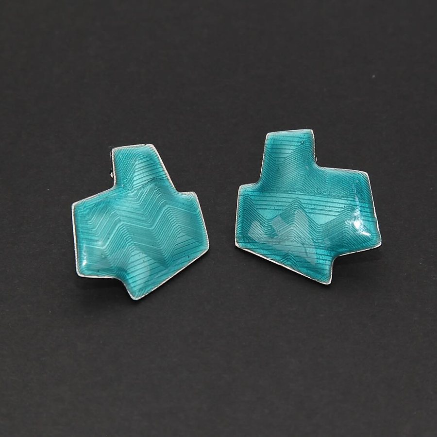 Pair of angular silver stud earrings covered in petrol enamel over guilloché lines